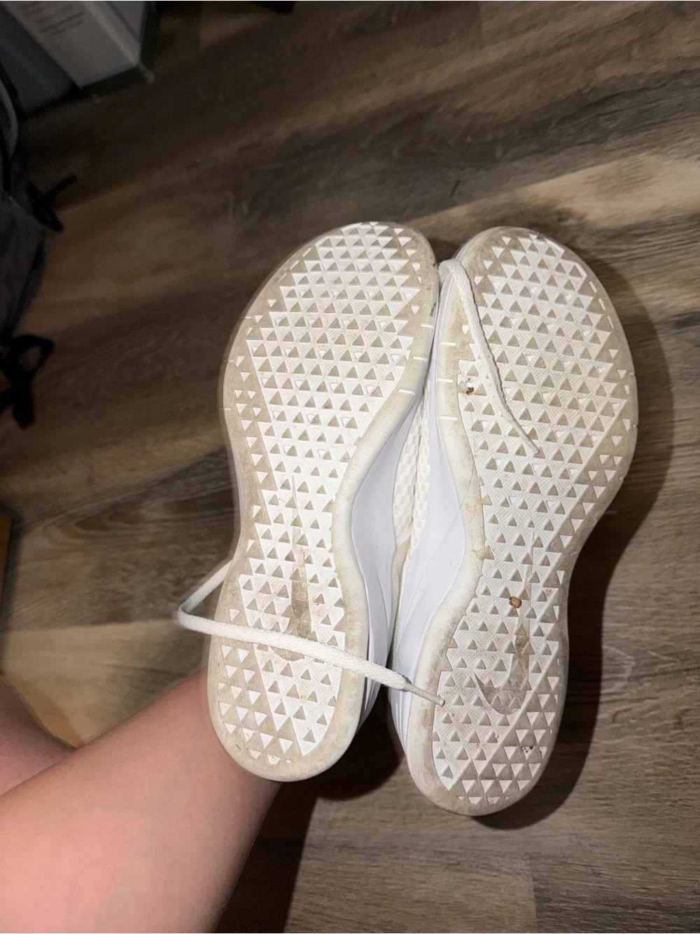 Nike Women's White Athletic Sneakers with Gold Swoosh